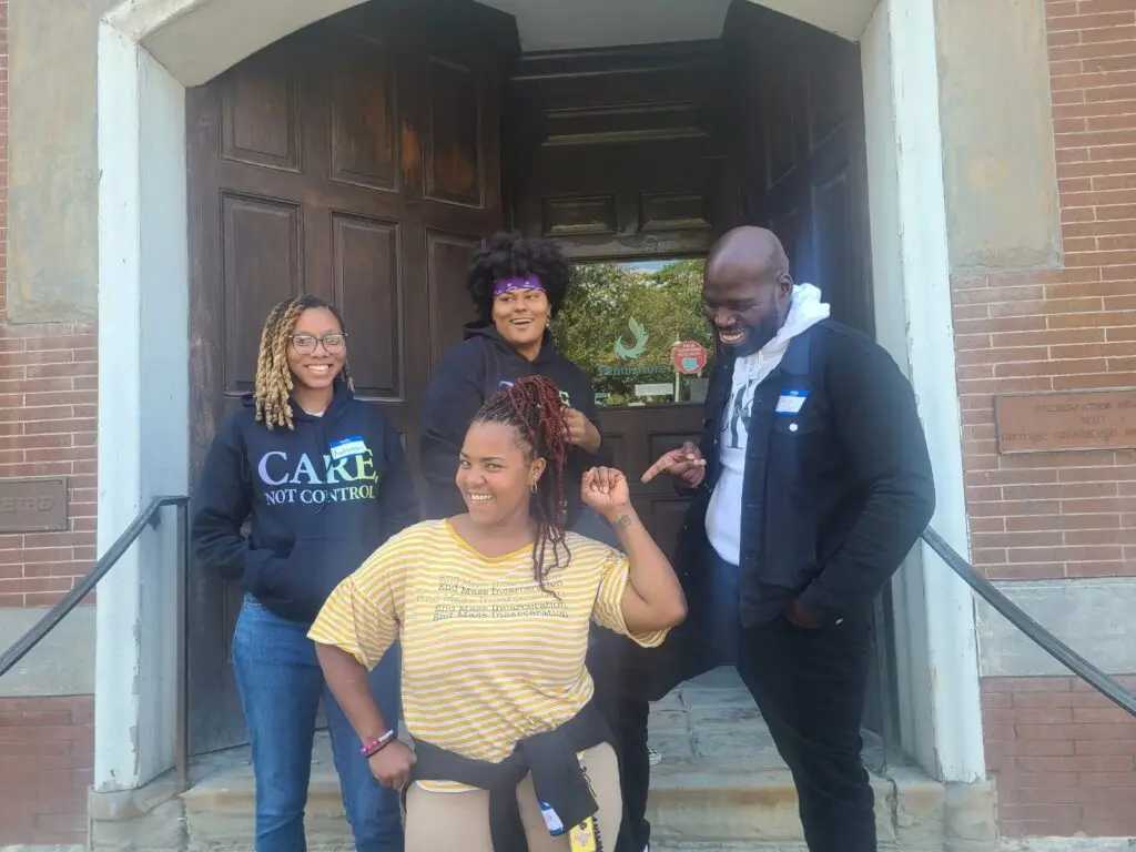 Care, Not Control members on the steps of a building in Harrisburg